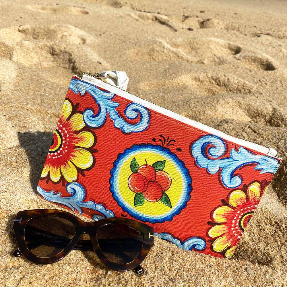 Arancio Piana Orange Sicily Clutch Bag on beach