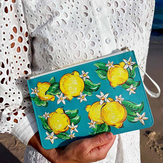 Amalfi Coast Lemon Clutch against broderie anglaise dress