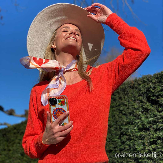 Taormina Phone Case shown with model Elze Mieke Tijl