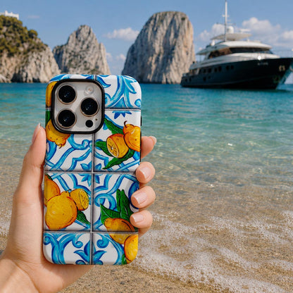 Lemon and blue maiolica tile phone case held in Capri Italy