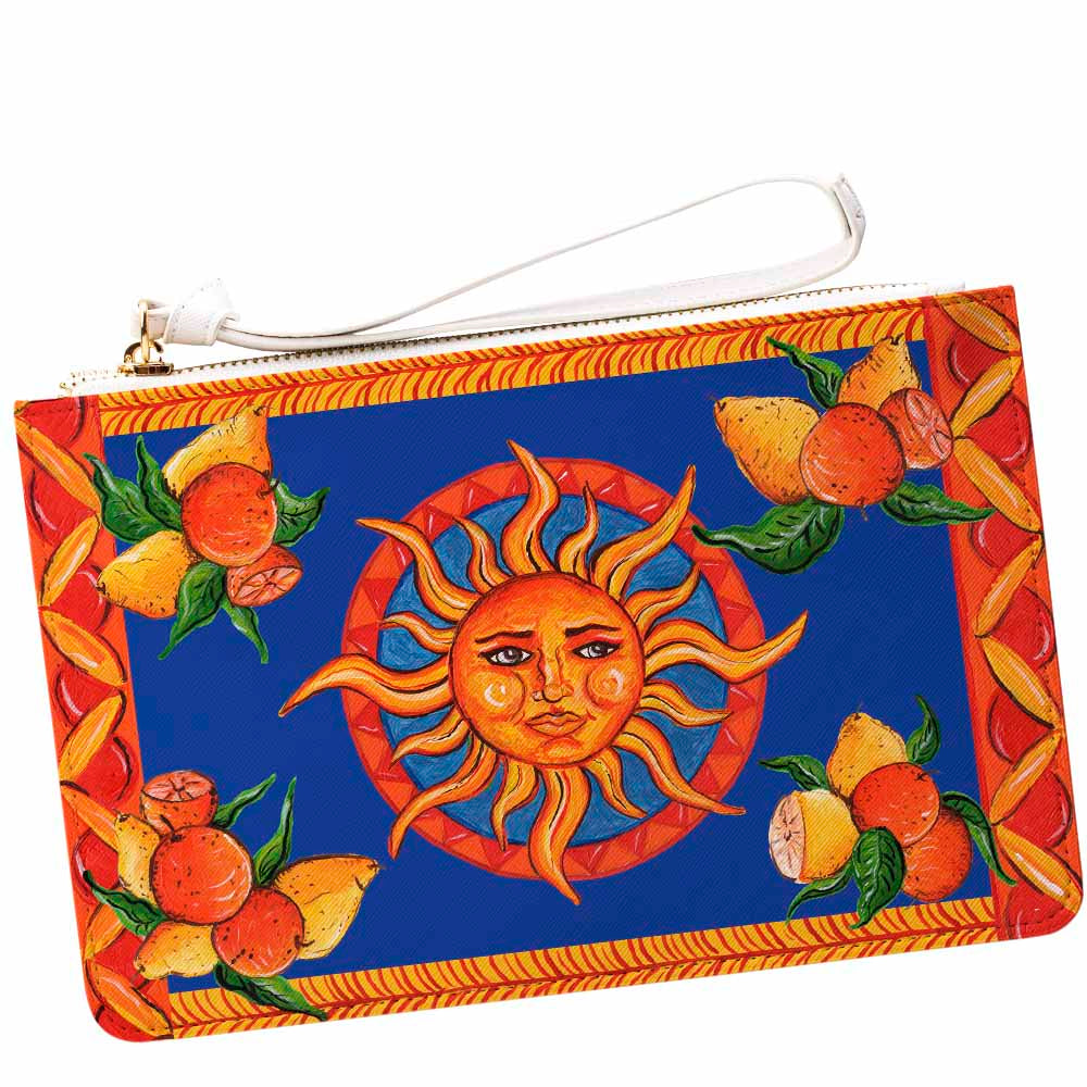 Bam Bar Taormina design clutch bag with blue background lemons and oranges