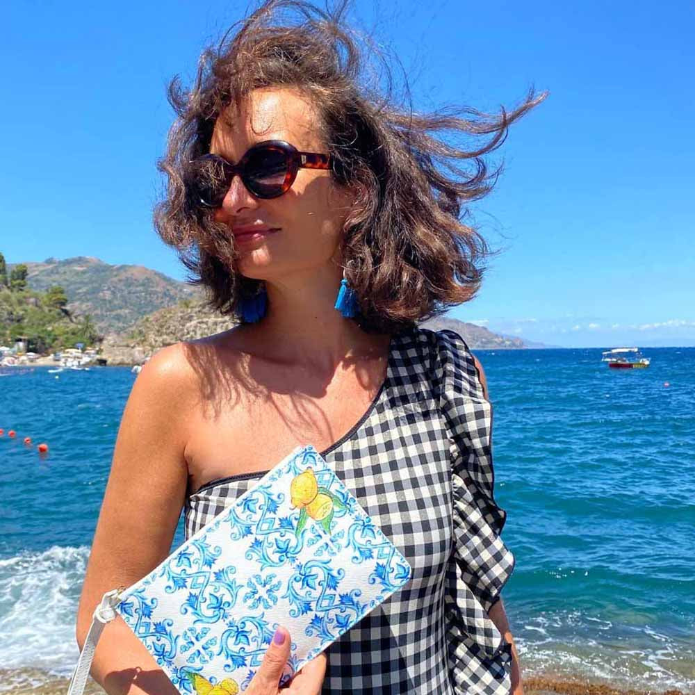 Model in Taormina wears lemon tile design purse