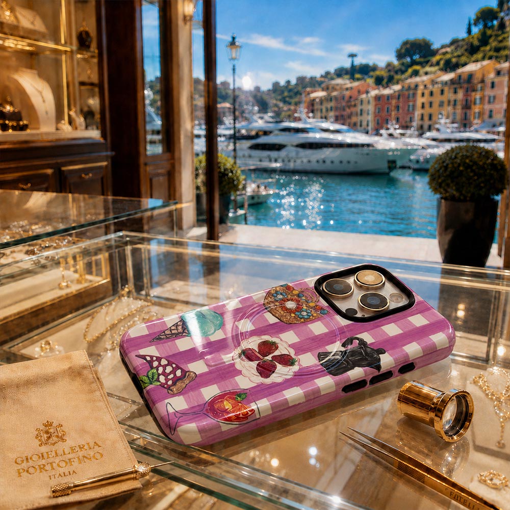 Luxury pink chckered phone case in jewleery store in yacht marina in Italy
