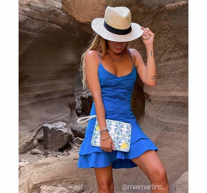 Model wearing fashionable Italian lemon design purse