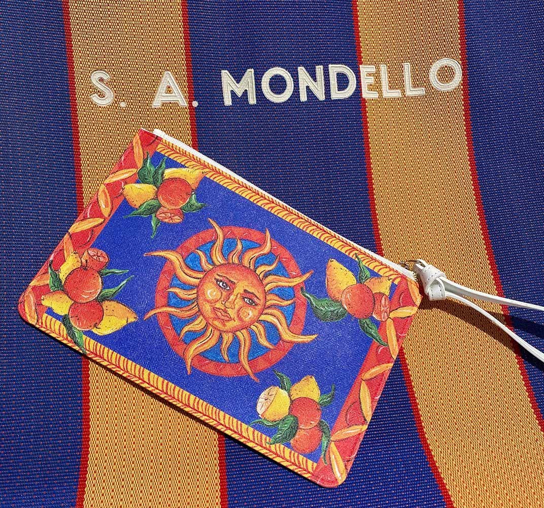 Bam Bar Taormina design purse with blue background lemons and oranges