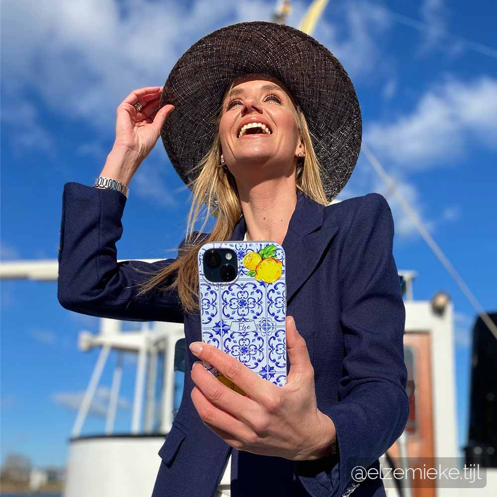 Lemon and Blue Handpainted iPhone case held by Elze Mieke Tijl