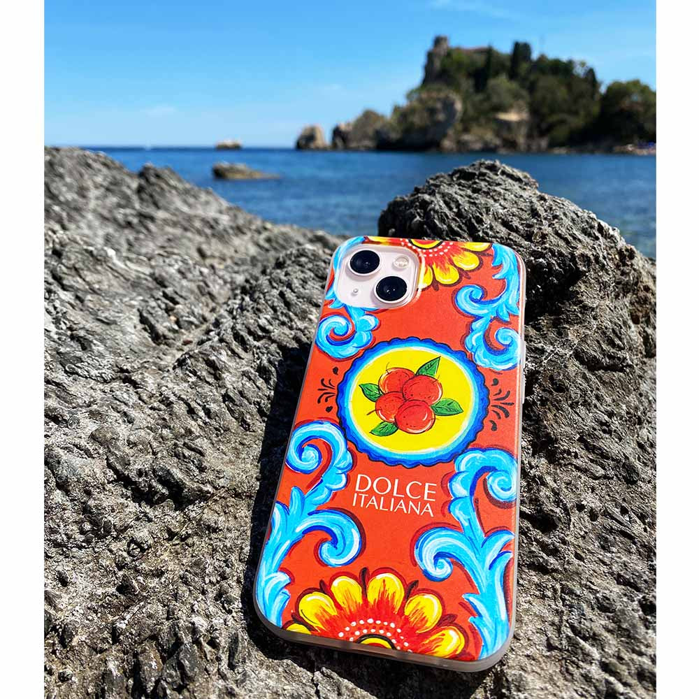 Arancio Orange iPhone cover on rock in Taormina Italy